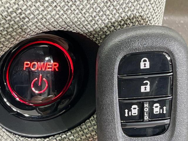 フリード e:HEVエアー EX 登録済未使用車 両側電動スライドドア 衝突軽減装置 レーダークルーズ ハーフレザーシート 前席シートヒーター コーナーセンサー スマートキー LEDヘッドライト オートマチックハイビーム 車線逸脱警報(6枚目)