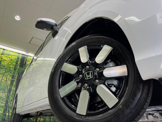 フリード e:HEVエアー EX 登録済未使用車 両側電動スライドドア 衝突軽減装置 レーダークルーズ ハーフレザーシート 前席シートヒーター コーナーセンサー スマートキー LEDヘッドライト オートマチックハイビーム 車線逸脱警報(13枚目)