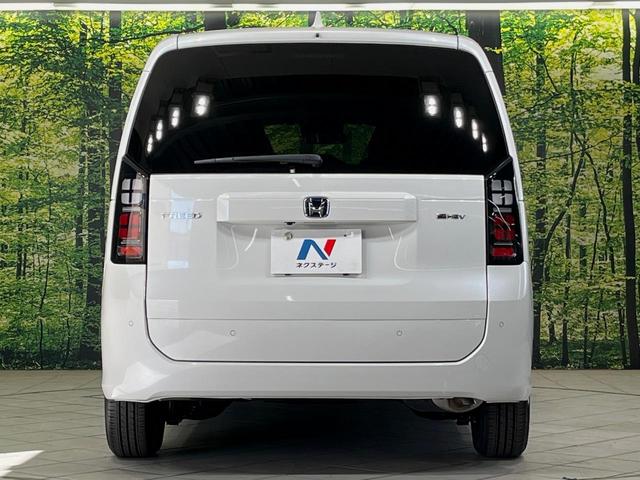 フリード e:HEVエアー EX 登録済未使用車 両側電動スライドドア 衝突軽減装置 レーダークルーズ ハーフレザーシート 前席シートヒーター コーナーセンサー スマートキー LEDヘッドライト オートマチックハイビーム 車線逸脱警報(15枚目)