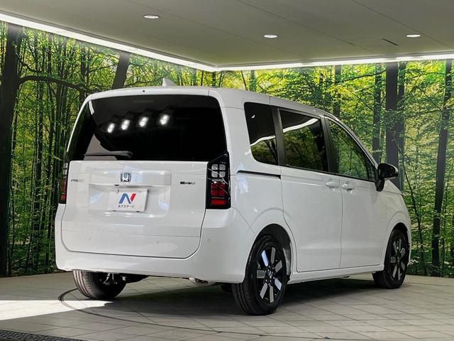 フリード e:HEVエアー EX 登録済未使用車 両側電動スライドドア 衝突軽減装置 レーダークルーズ ハーフレザーシート 前席シートヒーター コーナーセンサー スマートキー LEDヘッドライト オートマチックハイビーム 車線逸脱警報(17枚目)