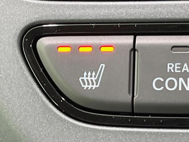 フリード e:HEVエアー EX 登録済未使用車 両側電動スライドドア 衝突軽減装置 レーダークルーズ ハーフレザーシート 前席シートヒーター コーナーセンサー スマートキー LEDヘッドライト オートマチックハイビーム 車線逸脱警報(24枚目)