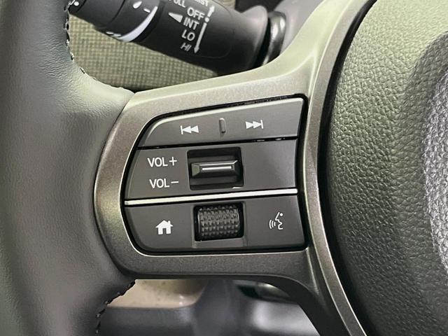 フリード e:HEVエアー EX 登録済未使用車 両側電動スライドドア 衝突軽減装置 レーダークルーズ ハーフレザーシート 前席シートヒーター コーナーセンサー スマートキー LEDヘッドライト オートマチックハイビーム 車線逸脱警報(27枚目)