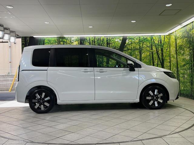 フリード e:HEVエアー EX 登録済未使用車 両側電動スライドドア 衝突軽減装置 レーダークルーズ ハーフレザーシート 前席シートヒーター コーナーセンサー スマートキー LEDヘッドライト オートマチックハイビーム 車線逸脱警報(52枚目)