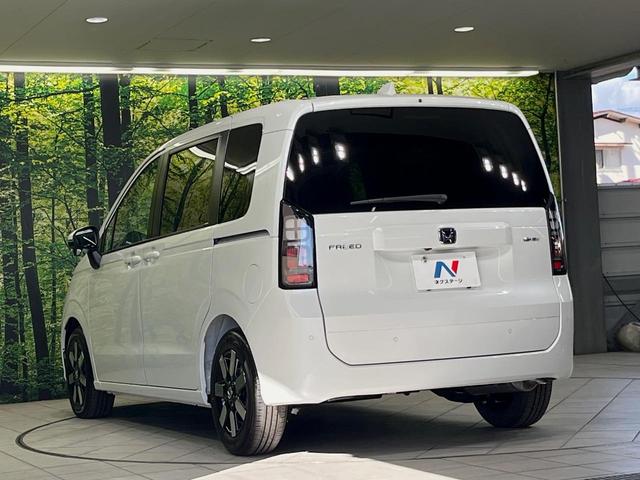 フリード e:HEVエアー EX 登録済未使用車 両側電動スライドドア 衝突軽減装置 レーダークルーズ ハーフレザーシート 前席シートヒーター コーナーセンサー スマートキー LEDヘッドライト オートマチックハイビーム 車線逸脱警報(53枚目)