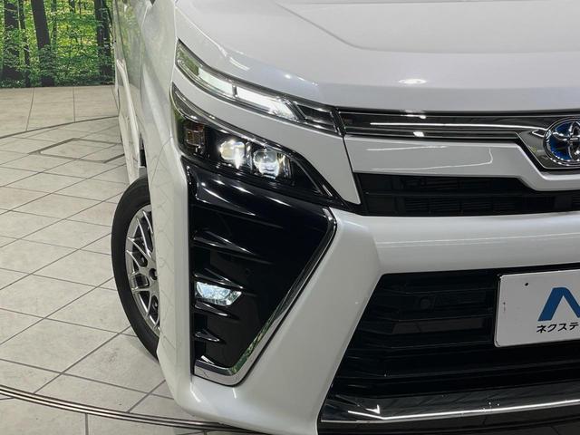 ヴォクシー ハイブリッドZS 煌III 純正10型ナビ 後席モニター バックカメラ 両側電動スライドドア 衝突軽減装置 LEDヘッド 前席シートヒーター クルーズコントロール ドラレコ リアオートエアコン スマートキー オートハイビーム(12枚目)