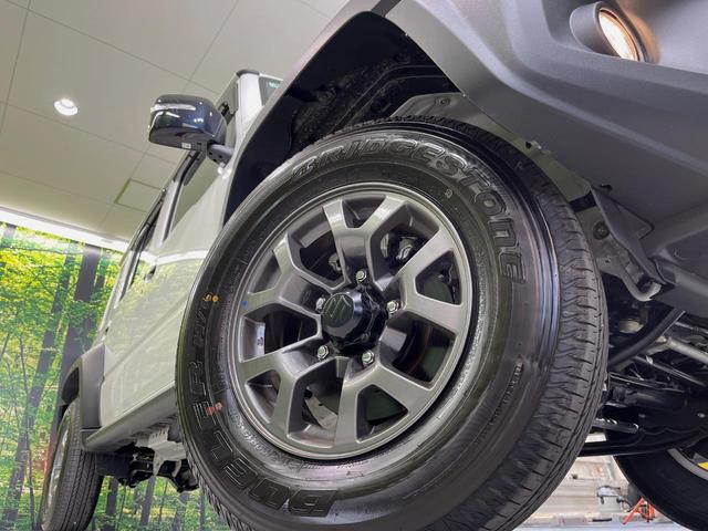 ジムニーノマド FC 衝突軽減装置 レーダークルーズ 禁煙車 コーナーセンサー スマートキー LEDヘッドライト ETC オートマチックハイビーム 車線逸脱警報 オートライト オートエアコン 純正15インチアルミホイル(13枚目)