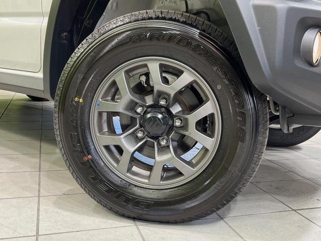 ジムニーノマド FC 衝突軽減装置 レーダークルーズ 禁煙車 コーナーセンサー スマートキー LEDヘッドライト ETC オートマチックハイビーム 車線逸脱警報 オートライト オートエアコン 純正15インチアルミホイル(59枚目)