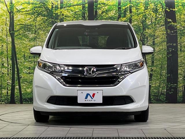 フリード G・ホンダセンシング 純正9型ナビ バックカメラ 後席モニター 両側電動スライドドア 衝突軽減装置 レーダークルーズ 禁煙車 前後ドラレコ スマートキー ETC 車線逸脱警報 オートライト オートエアコン 横滑り防止装置(14枚目)