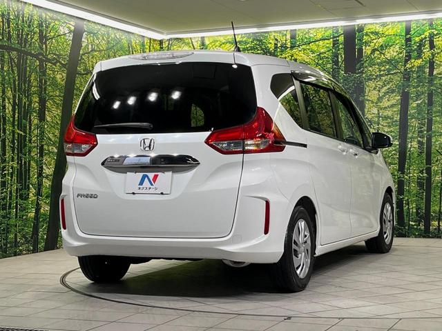 フリード G・ホンダセンシング 純正9型ナビ バックカメラ 後席モニター 両側電動スライドドア 衝突軽減装置 レーダークルーズ 禁煙車 前後ドラレコ スマートキー ETC 車線逸脱警報 オートライト オートエアコン 横滑り防止装置(17枚目)