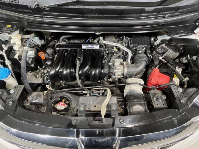 フリード G・ホンダセンシング 純正9型ナビ バックカメラ 後席モニター 両側電動スライドドア 衝突軽減装置 レーダークルーズ 禁煙車 前後ドラレコ スマートキー ETC 車線逸脱警報 オートライト オートエアコン 横滑り防止装置(18枚目)