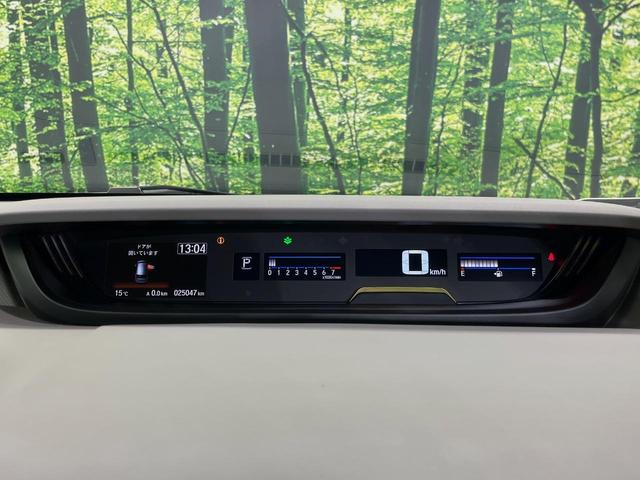 フリード G・ホンダセンシング 純正9型ナビ バックカメラ 後席モニター 両側電動スライドドア 衝突軽減装置 レーダークルーズ 禁煙車 前後ドラレコ スマートキー ETC 車線逸脱警報 オートライト オートエアコン 横滑り防止装置(26枚目)