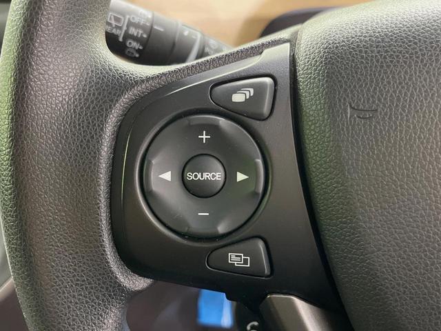 フリード G・ホンダセンシング 純正9型ナビ バックカメラ 後席モニター 両側電動スライドドア 衝突軽減装置 レーダークルーズ 禁煙車 前後ドラレコ スマートキー ETC 車線逸脱警報 オートライト オートエアコン 横滑り防止装置(27枚目)