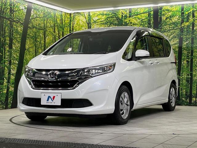 フリード G・ホンダセンシング 純正9型ナビ バックカメラ 後席モニター 両側電動スライドドア 衝突軽減装置 レーダークルーズ 禁煙車 前後ドラレコ スマートキー ETC 車線逸脱警報 オートライト オートエアコン 横滑り防止装置(54枚目)