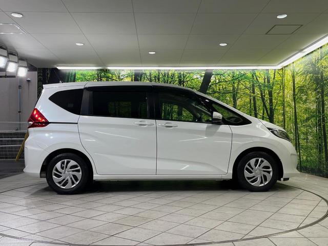 フリード G・ホンダセンシング 純正9型ナビ バックカメラ 後席モニター 両側電動スライドドア 衝突軽減装置 レーダークルーズ 禁煙車 前後ドラレコ スマートキー ETC 車線逸脱警報 オートライト オートエアコン 横滑り防止装置(56枚目)