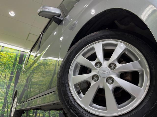 タント カスタムＸ　ＳＤナビ　オートエアコン　スマートキー　ＥＴＣ　ＨＩＤヘッド　純正１４インチアルミ　フォグランプ　電動格納ミラー　パワーウィンドウ　プライバシーガラス　盗難防止装置　地デジ　禁煙車　パワーステアリング（13枚目）