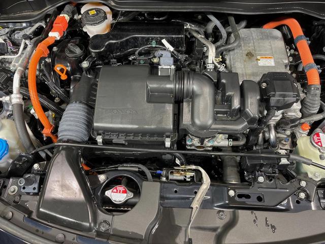 フィット e:HEVホーム 純正9型ナビ バックカメラ 衝突軽減装置 レーダークルーズ 禁煙車 ハーフレザーシート 前後ドラレコ コーナーセンサー スマートキー LEDヘッドライト ETC オートハイビーム 革巻きハンドル(18枚目)