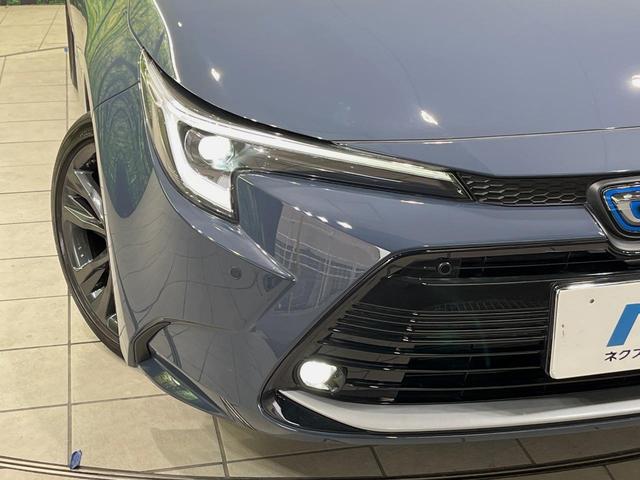 カローラツーリング ハイブリッド ダブルバイビー 純正10型ディスプレイオーディオ バックカメラ 衝突軽減装置 ETC シートヒーター レーダークルーズ 車線逸脱警報 純正17インチアルミ LEDヘッド ステアリングヒーター 電動パーキングブレーキ(12枚目)