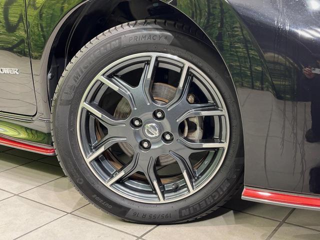 ノート e-パワーニスモ 純正ナビ 全周囲カメラ 衝突軽減装置 レーダークルーズ 禁煙車 ドラレコ コーナーセンサー スマートキー LEDヘッドライト ETC オートハイビーム 車線逸脱警報 オートライト 革巻きハンドル(55枚目)