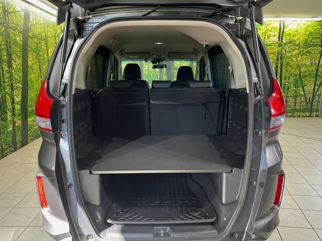 フリード+ハイブリッド ハイブリッドEX メーカー純正ナビ バックカメラ 衝突軽減装置 レーダークルーズ 両側電動スライドドア ハーフレザーシート LEDヘッド 前席シートヒーター ETC スマートキー ステアリングスイッチ オートエアコン(10枚目)