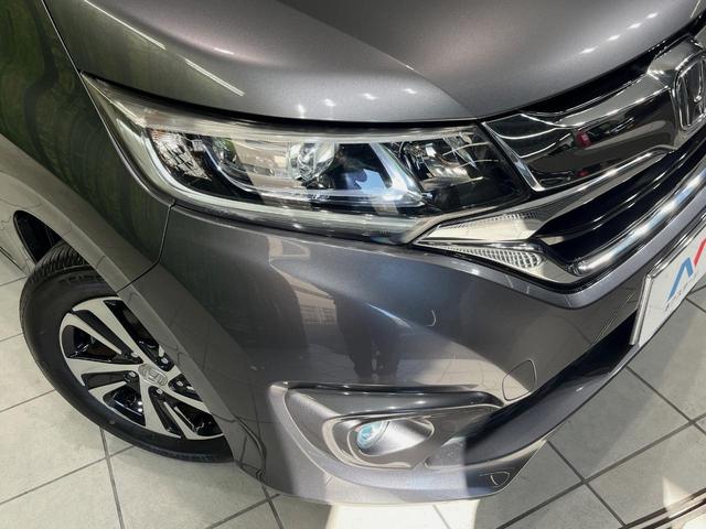 フリード+ハイブリッド ハイブリッドEX メーカー純正ナビ バックカメラ 衝突軽減装置 レーダークルーズ 両側電動スライドドア ハーフレザーシート LEDヘッド 前席シートヒーター ETC スマートキー ステアリングスイッチ オートエアコン(12枚目)