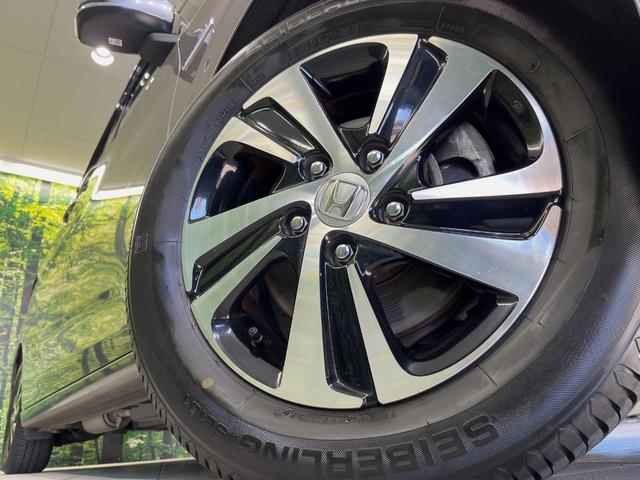 フリード+ハイブリッド ハイブリッドEX メーカー純正ナビ バックカメラ 衝突軽減装置 レーダークルーズ 両側電動スライドドア ハーフレザーシート LEDヘッド 前席シートヒーター ETC スマートキー ステアリングスイッチ オートエアコン(13枚目)