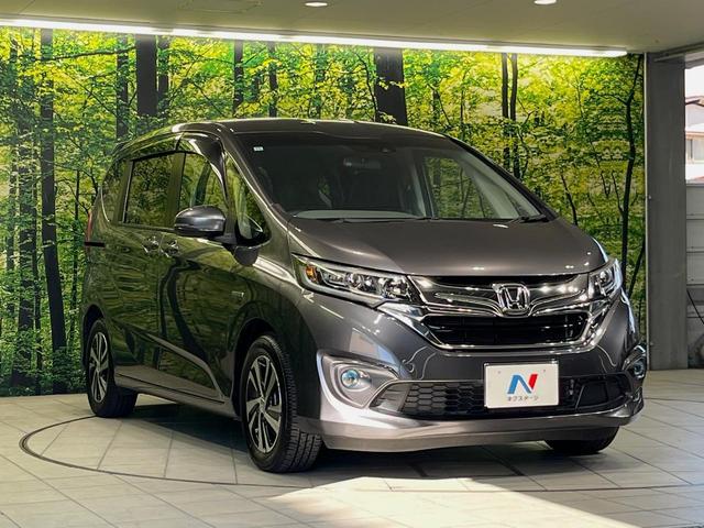 フリード+ハイブリッド ハイブリッドEX メーカー純正ナビ バックカメラ 衝突軽減装置 レーダークルーズ 両側電動スライドドア ハーフレザーシート LEDヘッド 前席シートヒーター ETC スマートキー ステアリングスイッチ オートエアコン(16枚目)