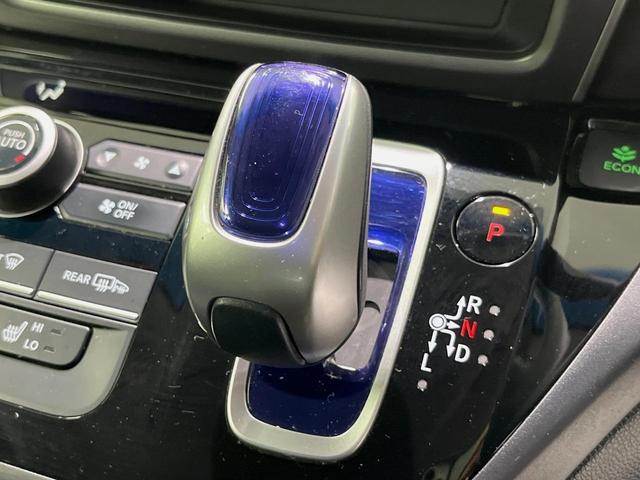 フリード+ハイブリッド ハイブリッドEX メーカー純正ナビ バックカメラ 衝突軽減装置 レーダークルーズ 両側電動スライドドア ハーフレザーシート LEDヘッド 前席シートヒーター ETC スマートキー ステアリングスイッチ オートエアコン(21枚目)