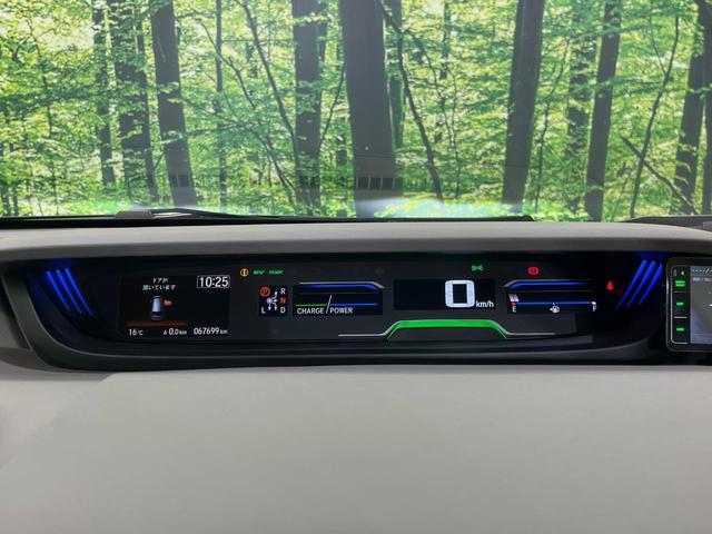 フリード+ハイブリッド ハイブリッドEX メーカー純正ナビ バックカメラ 衝突軽減装置 レーダークルーズ 両側電動スライドドア ハーフレザーシート LEDヘッド 前席シートヒーター ETC スマートキー ステアリングスイッチ オートエアコン(26枚目)