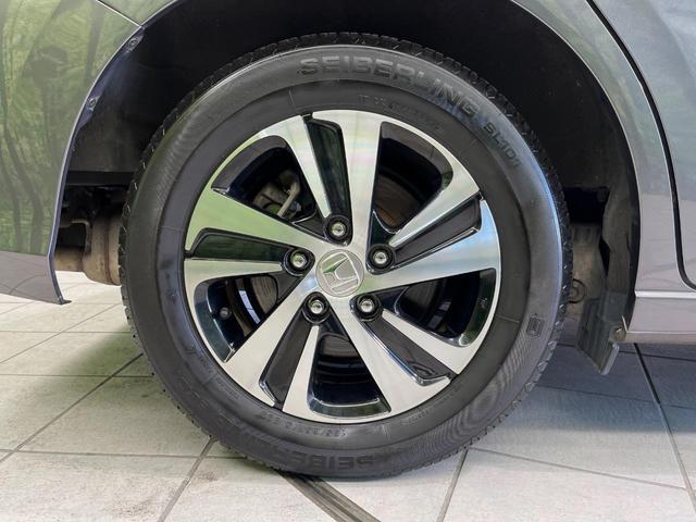 フリード+ハイブリッド ハイブリッドEX メーカー純正ナビ バックカメラ 衝突軽減装置 レーダークルーズ 両側電動スライドドア ハーフレザーシート LEDヘッド 前席シートヒーター ETC スマートキー ステアリングスイッチ オートエアコン(57枚目)