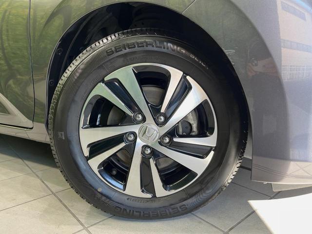 フリード+ハイブリッド ハイブリッドEX メーカー純正ナビ バックカメラ 衝突軽減装置 レーダークルーズ 両側電動スライドドア ハーフレザーシート LEDヘッド 前席シートヒーター ETC スマートキー ステアリングスイッチ オートエアコン(58枚目)