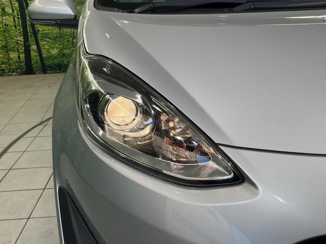 アクア L SDナビ 禁煙車 ドラレコ ETC オートエアコン Bluetooth CD/DVD再生 パワーウィンドウ バニティミラー キーレス 電動格納ミラー ドアバイザー 横滑り防止装置 プライバシーガラス(12枚目)