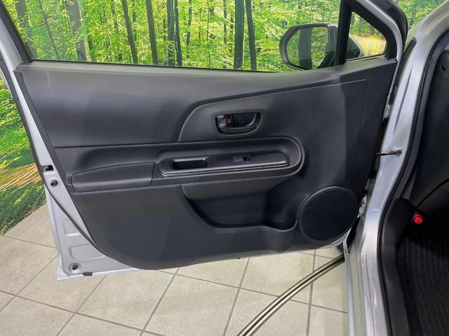 アクア L SDナビ 禁煙車 ドラレコ ETC オートエアコン Bluetooth CD/DVD再生 パワーウィンドウ バニティミラー キーレス 電動格納ミラー ドアバイザー 横滑り防止装置 プライバシーガラス(34枚目)