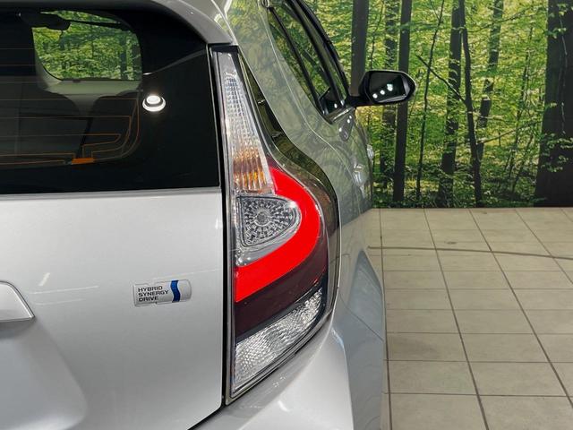 アクア L SDナビ 禁煙車 ドラレコ ETC オートエアコン Bluetooth CD/DVD再生 パワーウィンドウ バニティミラー キーレス 電動格納ミラー ドアバイザー 横滑り防止装置 プライバシーガラス(44枚目)