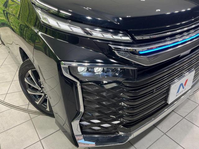 ヴォクシー ハイブリッドS-Z メーカー10.5型ナビ 後席モニター 快適PKG 全周囲カメラ トヨタチームメイト ブラインドスポットモニター デジタルインナーミラー プロジェクター式LEDヘッドライト シートカバー ETC 禁煙車(12枚目)