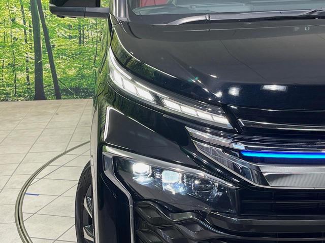 ヴォクシー ハイブリッドS-Z メーカー10.5型ナビ 後席モニター 快適PKG 全周囲カメラ トヨタチームメイト ブラインドスポットモニター デジタルインナーミラー プロジェクター式LEDヘッドライト シートカバー ETC 禁煙車(69枚目)