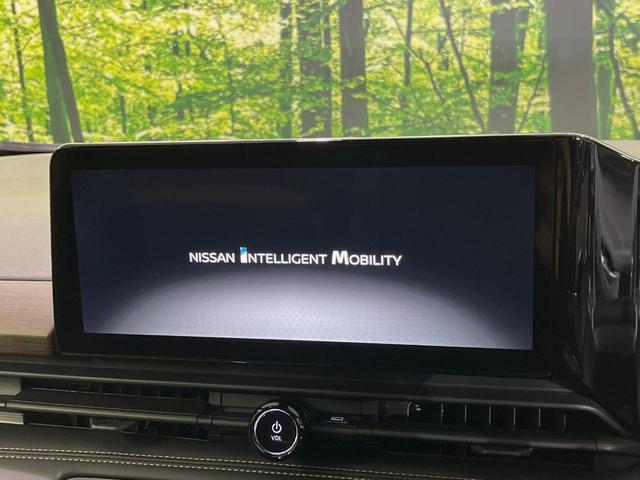 セレナ ハイウェイスターV メーカー12.3型ナビ 全周囲カメラ 両側電動スライドドア 後席モニター 衝突軽減装置 プロパイロット 禁煙車 ハーフレザーシート 前後ドラレコ コーナーセンサー スマートキー LEDヘッドライト(3枚目)