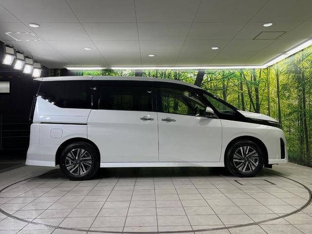 セレナ ハイウェイスターV メーカー12.3型ナビ 全周囲カメラ 両側電動スライドドア 後席モニター 衝突軽減装置 プロパイロット 禁煙車 ハーフレザーシート 前後ドラレコ コーナーセンサー スマートキー LEDヘッドライト(56枚目)