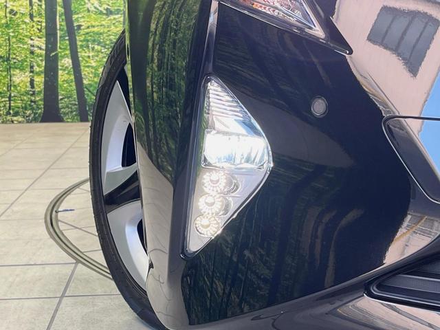 プリウス Aプレミアム ツーリングセレクション 純正9型ナビ バックカメラ 衝突軽減装置 100V電源 レーダークルーズ 禁煙車 革シート パワーシート シートヒーター ドラレコ コーナーセンサー スマートキー ブラインドスポットモニター ETC(56枚目)