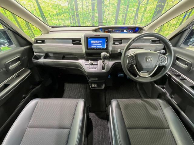 フリード Ｇ・ホンダセンシング　純正ナビ　バックカメラ　衝突言軽減装置　両側電動スライドドア　レーダークルーズ　禁煙車　ＬＥＤヘッド　革巻きステアリング　純正１５インチアルミ　シートヒーター　ＥＴＣ　スマートキー　車線逸脱警報（2枚目）