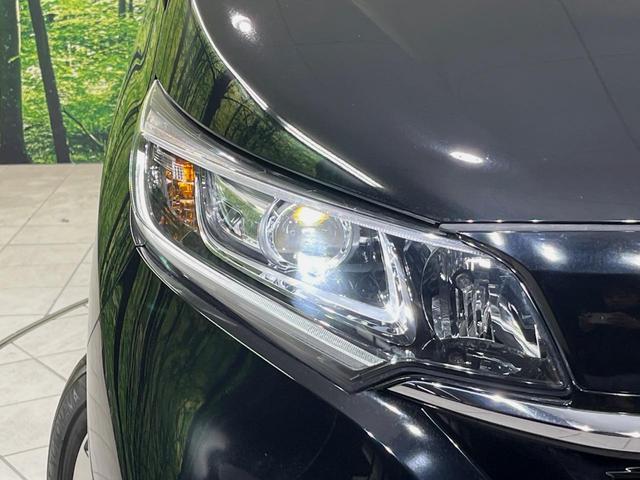 フリード Ｇ・ホンダセンシング　純正ナビ　バックカメラ　衝突言軽減装置　両側電動スライドドア　レーダークルーズ　禁煙車　ＬＥＤヘッド　革巻きステアリング　純正１５インチアルミ　シートヒーター　ＥＴＣ　スマートキー　車線逸脱警報（12枚目）