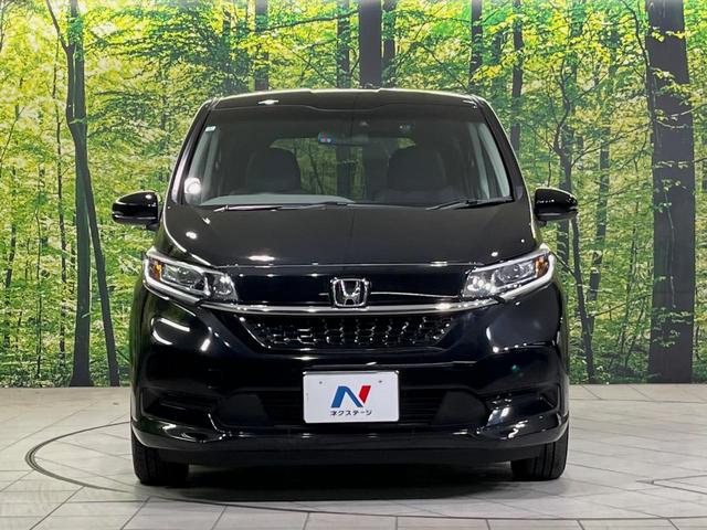 フリード Ｇ・ホンダセンシング　純正ナビ　バックカメラ　衝突言軽減装置　両側電動スライドドア　レーダークルーズ　禁煙車　ＬＥＤヘッド　革巻きステアリング　純正１５インチアルミ　シートヒーター　ＥＴＣ　スマートキー　車線逸脱警報（14枚目）