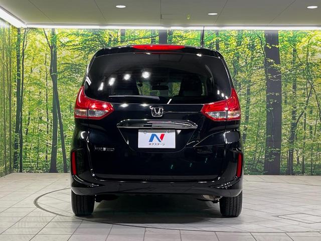 フリード Ｇ・ホンダセンシング　純正ナビ　バックカメラ　衝突言軽減装置　両側電動スライドドア　レーダークルーズ　禁煙車　ＬＥＤヘッド　革巻きステアリング　純正１５インチアルミ　シートヒーター　ＥＴＣ　スマートキー　車線逸脱警報（15枚目）