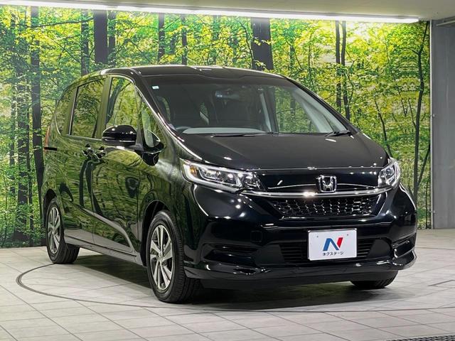 フリード Ｇ・ホンダセンシング　純正ナビ　バックカメラ　衝突言軽減装置　両側電動スライドドア　レーダークルーズ　禁煙車　ＬＥＤヘッド　革巻きステアリング　純正１５インチアルミ　シートヒーター　ＥＴＣ　スマートキー　車線逸脱警報（16枚目）