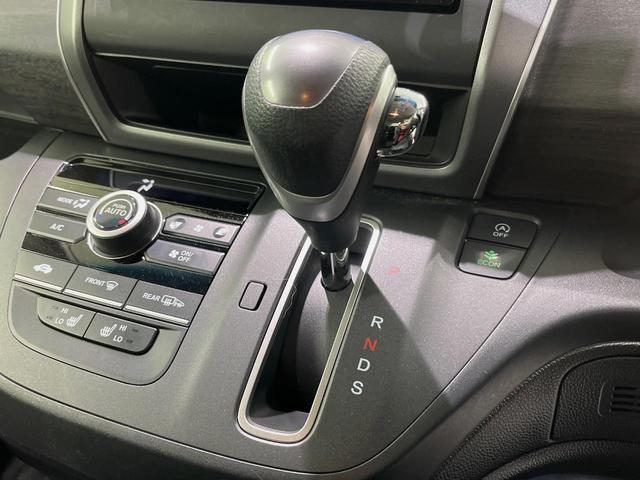 フリード Ｇ・ホンダセンシング　純正ナビ　バックカメラ　衝突言軽減装置　両側電動スライドドア　レーダークルーズ　禁煙車　ＬＥＤヘッド　革巻きステアリング　純正１５インチアルミ　シートヒーター　ＥＴＣ　スマートキー　車線逸脱警報（21枚目）