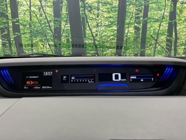 フリード Ｇ・ホンダセンシング　純正ナビ　バックカメラ　衝突言軽減装置　両側電動スライドドア　レーダークルーズ　禁煙車　ＬＥＤヘッド　革巻きステアリング　純正１５インチアルミ　シートヒーター　ＥＴＣ　スマートキー　車線逸脱警報（26枚目）