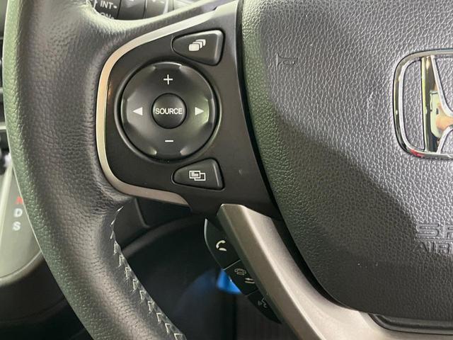 フリード Ｇ・ホンダセンシング　純正ナビ　バックカメラ　衝突言軽減装置　両側電動スライドドア　レーダークルーズ　禁煙車　ＬＥＤヘッド　革巻きステアリング　純正１５インチアルミ　シートヒーター　ＥＴＣ　スマートキー　車線逸脱警報（27枚目）