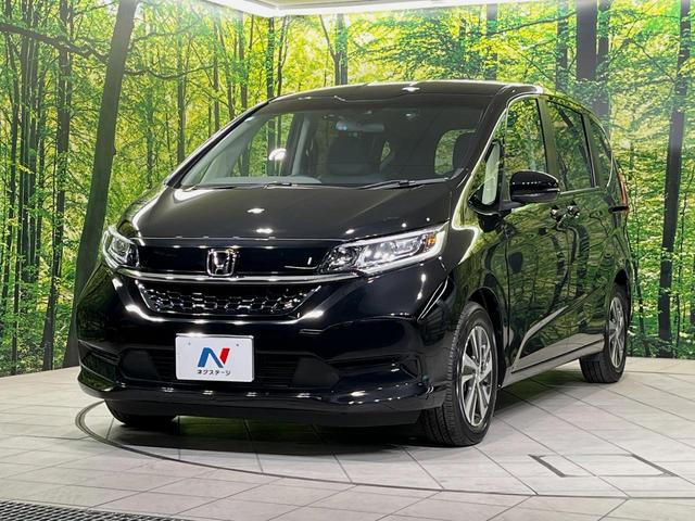フリード Ｇ・ホンダセンシング　純正ナビ　バックカメラ　衝突言軽減装置　両側電動スライドドア　レーダークルーズ　禁煙車　ＬＥＤヘッド　革巻きステアリング　純正１５インチアルミ　シートヒーター　ＥＴＣ　スマートキー　車線逸脱警報（51枚目）
