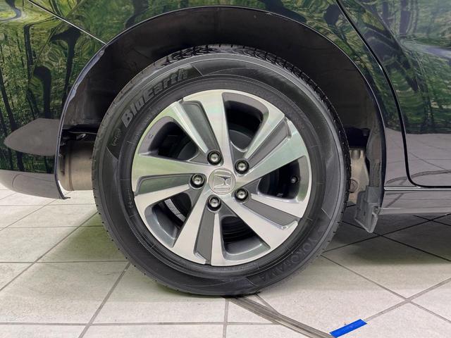 フリード Ｇ・ホンダセンシング　純正ナビ　バックカメラ　衝突言軽減装置　両側電動スライドドア　レーダークルーズ　禁煙車　ＬＥＤヘッド　革巻きステアリング　純正１５インチアルミ　シートヒーター　ＥＴＣ　スマートキー　車線逸脱警報（57枚目）