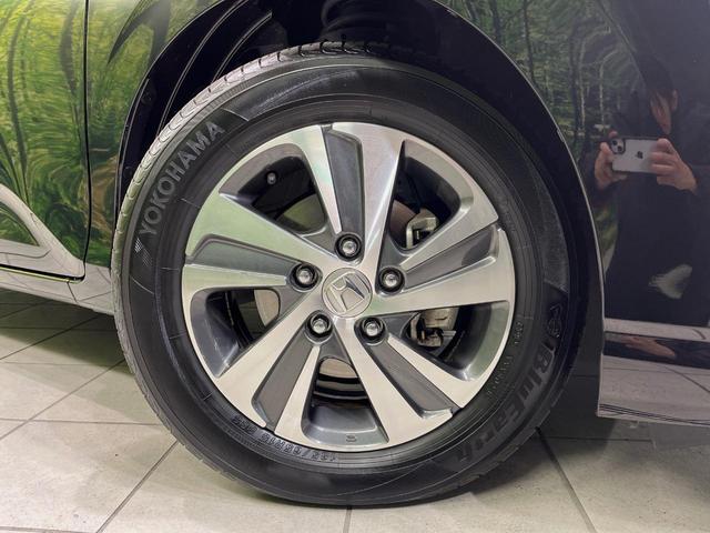 フリード Ｇ・ホンダセンシング　純正ナビ　バックカメラ　衝突言軽減装置　両側電動スライドドア　レーダークルーズ　禁煙車　ＬＥＤヘッド　革巻きステアリング　純正１５インチアルミ　シートヒーター　ＥＴＣ　スマートキー　車線逸脱警報（58枚目）