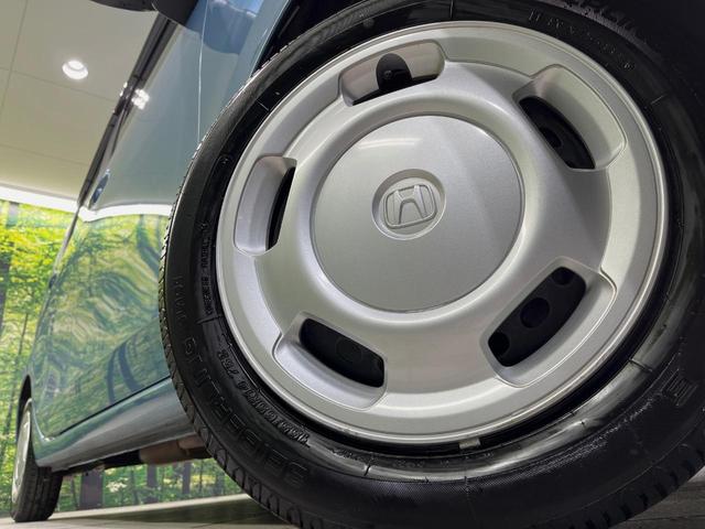 Ｎ－ＷＧＮ Ｇホンダセンシング　純正ナビ　衝突軽減装置　レーダークルーズ　禁煙車　コーナーセンサー　スマートキー　ＥＴＣ　オートマチックハイビーム　車線逸脱警報　オートライト　オートエアコン　Ｂｌｕｅｔｏｏｔｈ　ＣＤ　ＤＶＤ再生（13枚目）